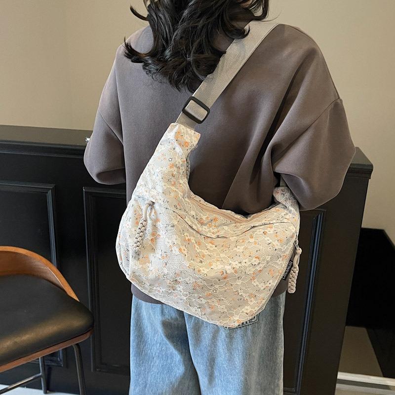 Niche floral dumpling bag women's new versatile shoulder bag versatile large-capacity casual messenger bag