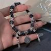 Pulseira de fofoca Tai Chi com design original de nicho, pulseira de contas pretas e tinta feminina, para casal
