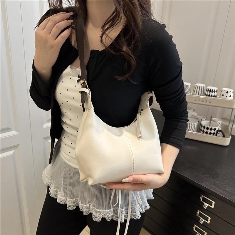 Niche simple retro shoulder messenger bag summer new fashion high sense armpit bag casual tote bag