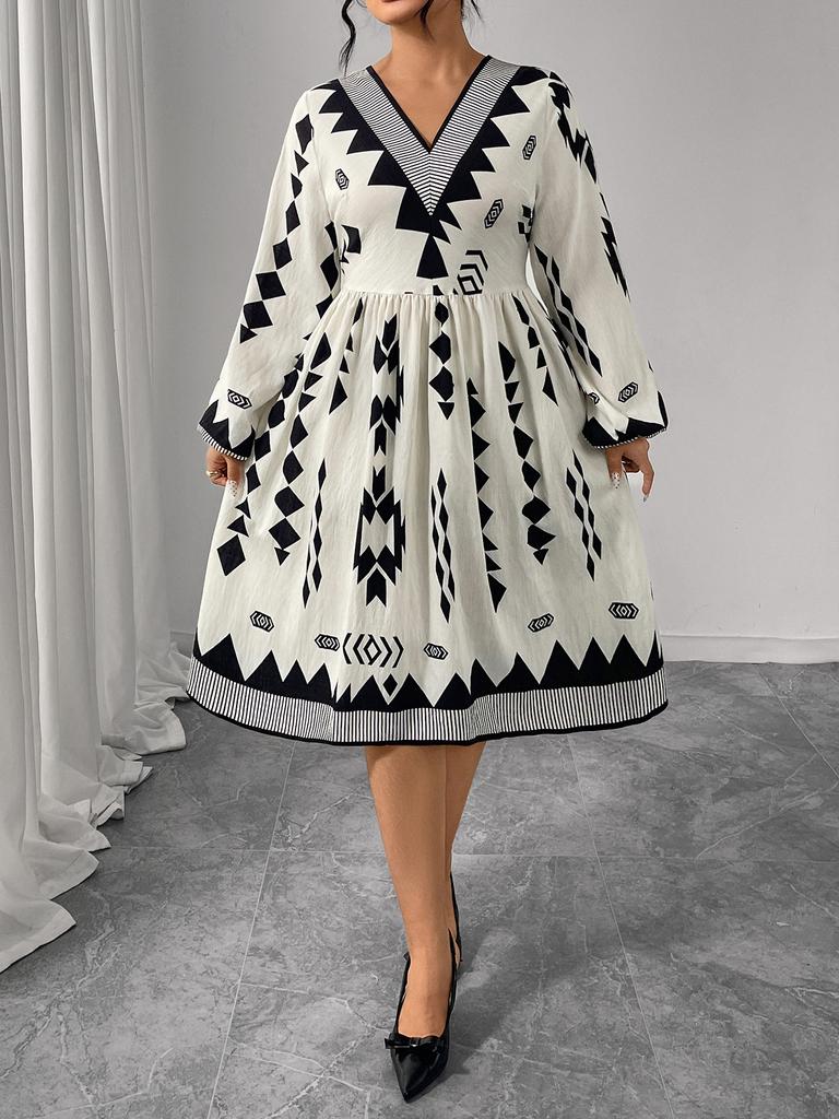 Foreign trade autumn and winter new dress large size fat mm printed bubble sleeve V-neck dress high waist and thin dress