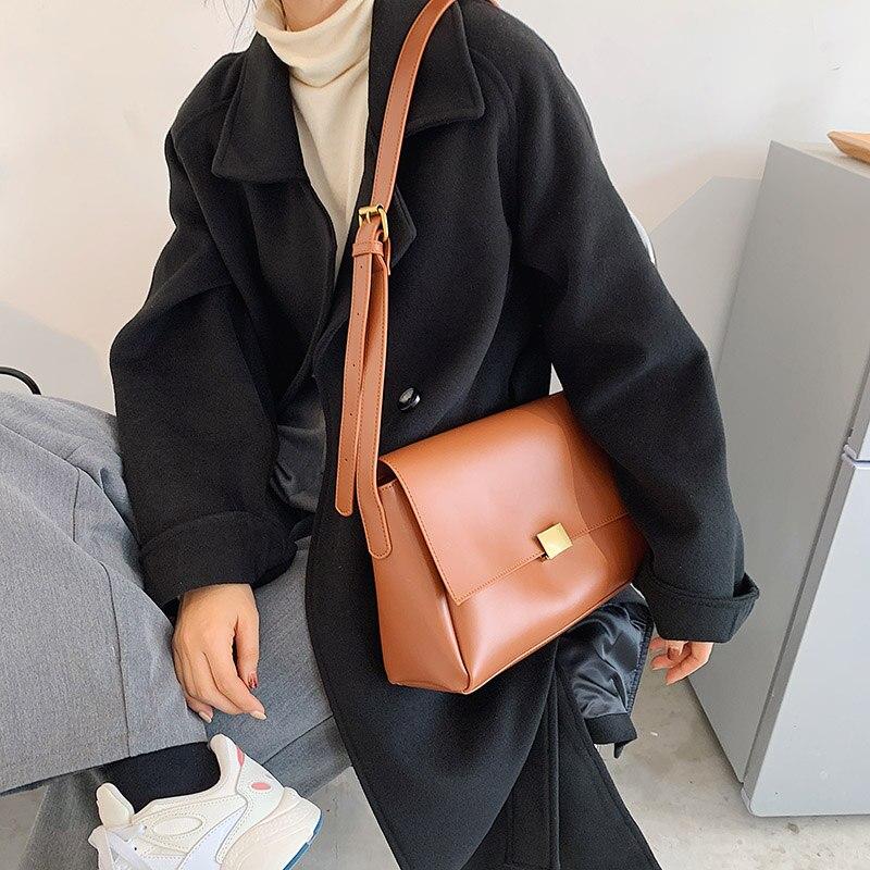 the trend black leather purse