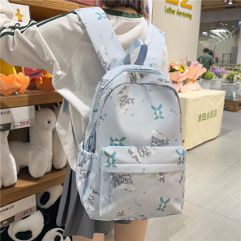 New small fresh junior high school college student schoolbag simple casual large capacity women's backpack light travel backpack