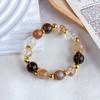 [Eisgold Geister] Natürliches Goldfolien-Kleberblumen-Armband Milchtee Mondlicht Schwarzgold Ultraweiß Asai-Kristall-Armband Großhandel