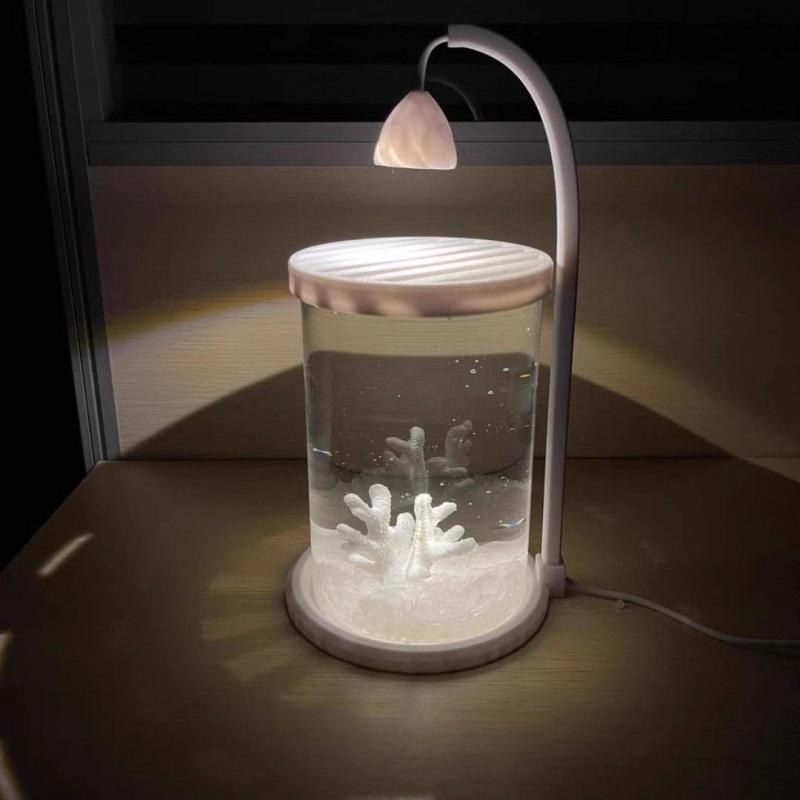 Creative Mini Betta Fish Glass Tank with Light for Desktop Decor, High-End Viewing, and Easy Maintenance.