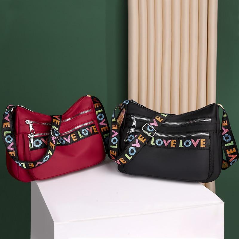 Oxford cloth messenger bag shoulder bag large capacity multi-pocket bag women's new fashion letter flow