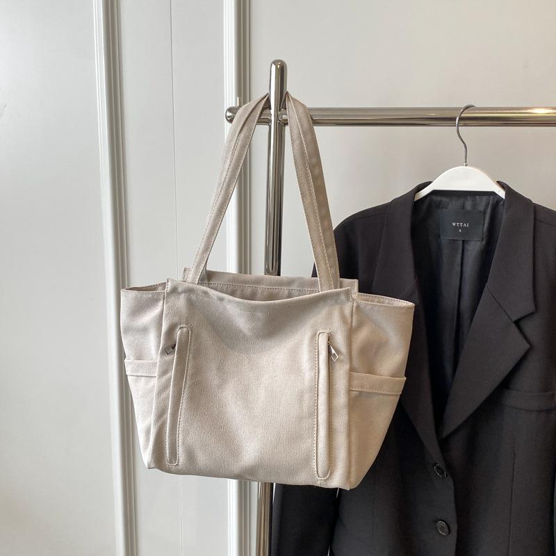 New large-capacity versatile handbag 2025 spring and summer popular lightweight shoulder bag simple tote hand carry big bag women