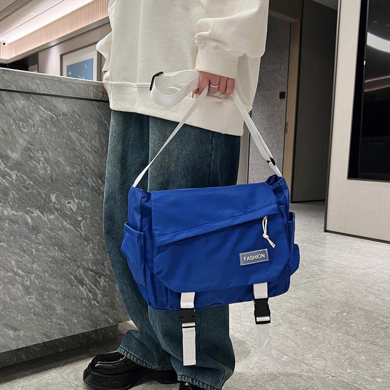 Large capacity tooling multi-pocket messenger bag leisure student shoulder versatile messenger bag solid color anti-splashing women's bag
