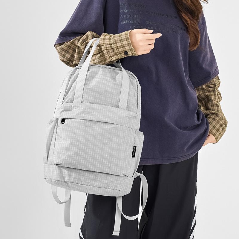 Schoolbag new Korean version fashion backpack casual plaid Japanese laptop bag multi-functional foldable student schoolbag
