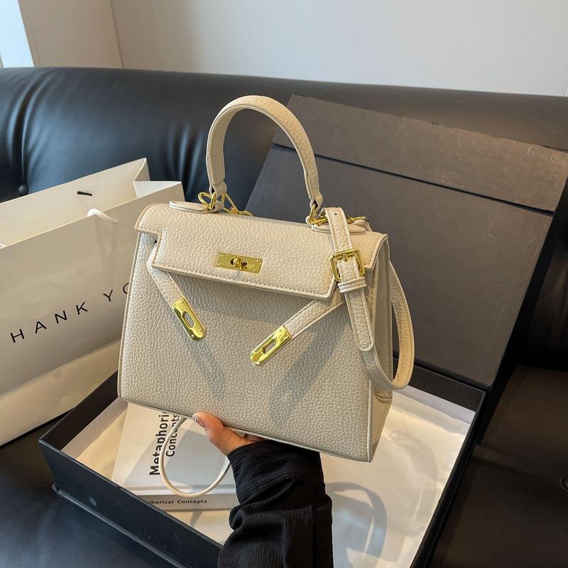 

Новый высококлассный однотонный замок, портативная женская сумка через плечо, трендовая