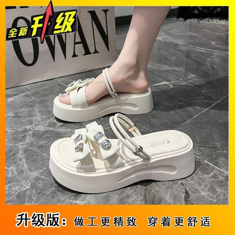 Thick-bottomed rhinestones wear one-word drag women 2025 summer new French style bow muffin versatile cool slippers