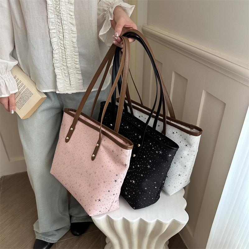 Personnalité étoile style étranger printemps nouveau grande capacité tendance style doux portable fourre-tout épaule aisselle sac pour femmes