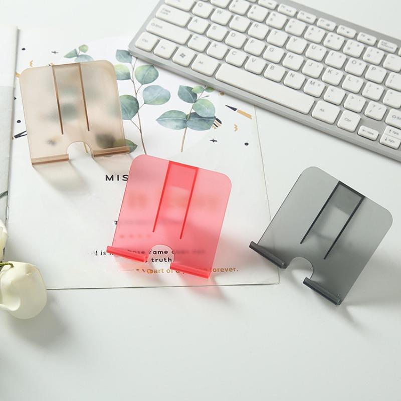 

Multi-functional Wall-mounted Mobile Phone Stand No Need for Drilling Bedside Charging Power Plug Storage Detachable and Tidy Transparent black