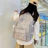 Large-capacity schoolbag women's high-value lazy wind dirt-resistant university campus class bag ins bear nylon backpack