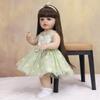 KEIUMI Realistic Reborn Baby Girl Dolls Wear Green Skirt Princess Doll Suit Christmas Holloween Decoration Gifts