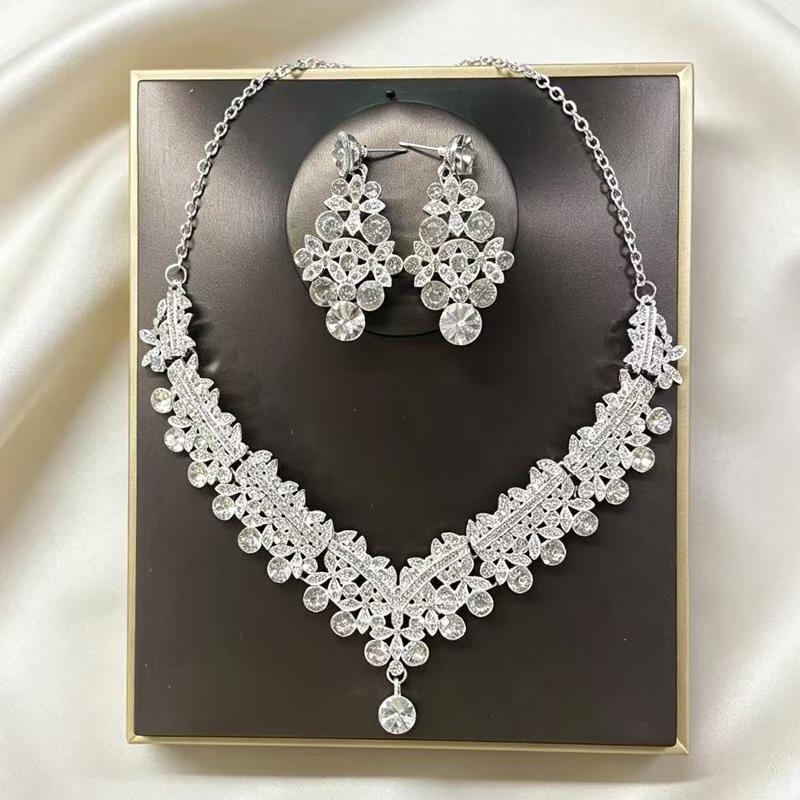 Elegant Court-Style Silver Needle Tassel Earrings with Diamond Accents
