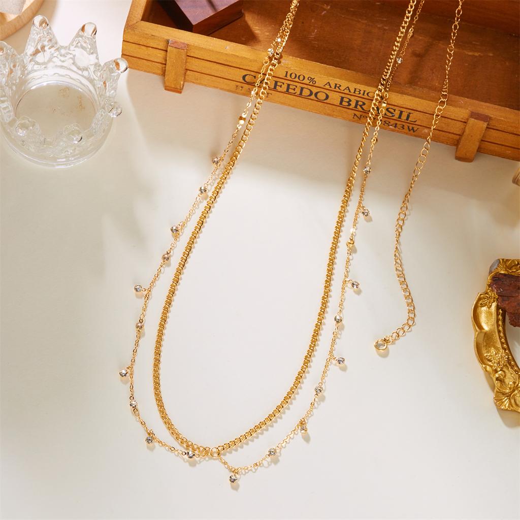 Cadena Cruzada de Doble Capa con Circonita Cúbica Anillo para Ombligo Cadena para la Cintura para Mujer Tono Dorado Cadena Corporal Ajustable Joyería para el Vientre