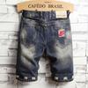 Men's Casual And Loose Broken Hole Stitching Drape Characteristic Foot Denim Shorts