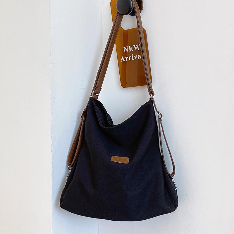 

Three-purpose backpack 2025 spring and summer new backpack school bag female college student canvas bag female shoulder messenger bag No specification чёрный