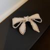 Elegant Iron White Rhinestone Bow Hair Clip Pearl Accented Spring Clip Butterfly Knot Hair Accessory For Women