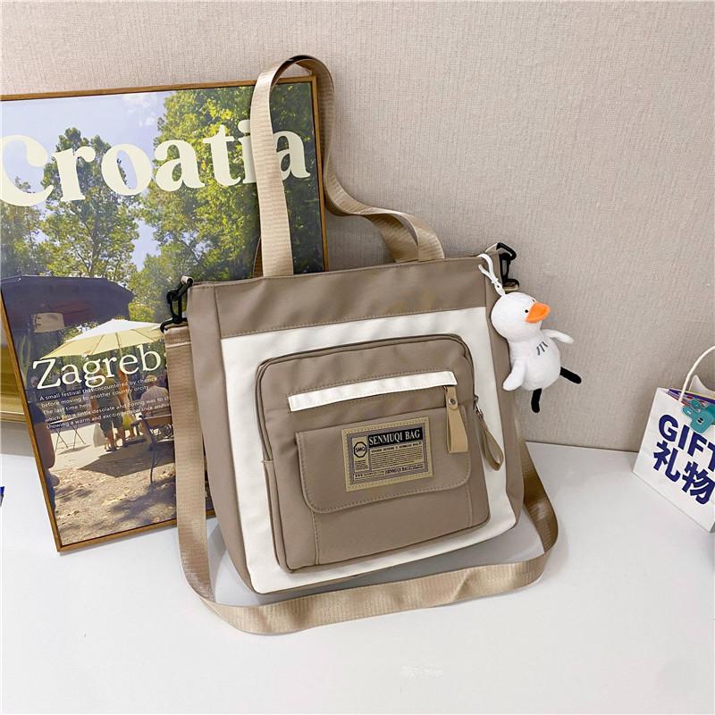 Canvas bag new large-capacity make-up bag dual-purpose tote bag women's schoolbag students junior high school high school canvas messenger bag
