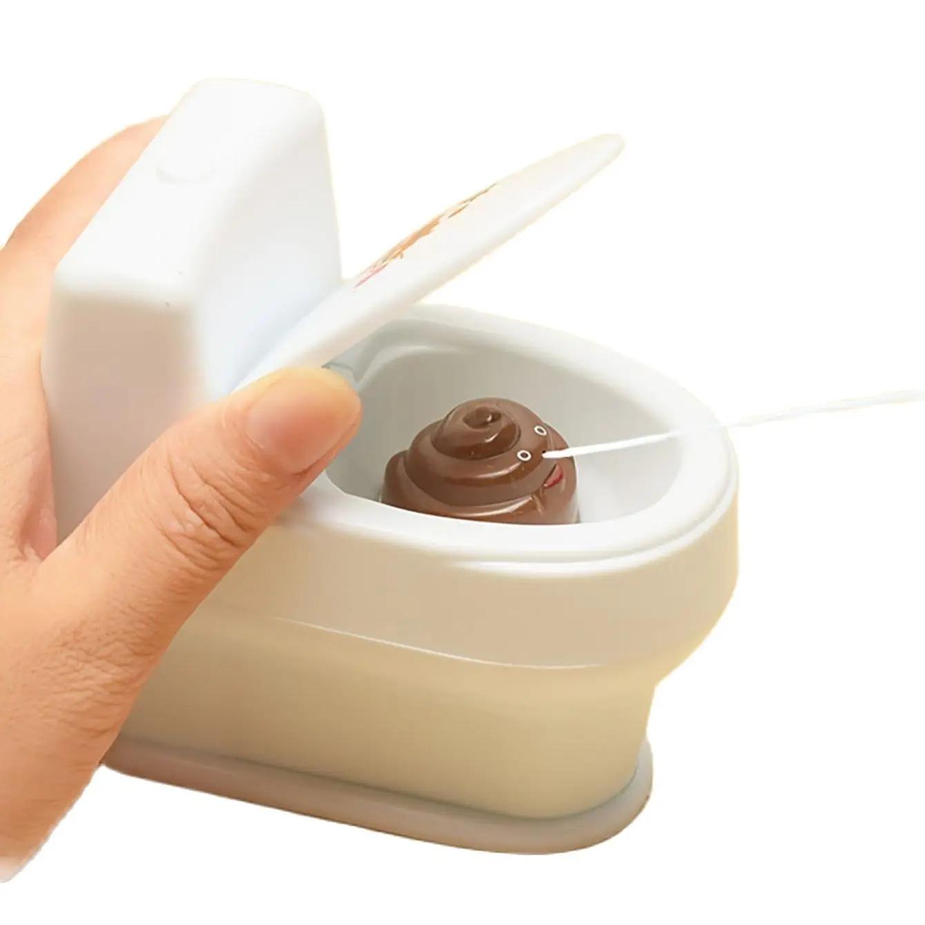 

1PC-Новинка Интересная игрушка-шутка с распылителем для какашек Шутка Cary Toys Мини-разбрызгиватель для туалета Пистолет-распылитель для туалета Моделирование игрушки белый