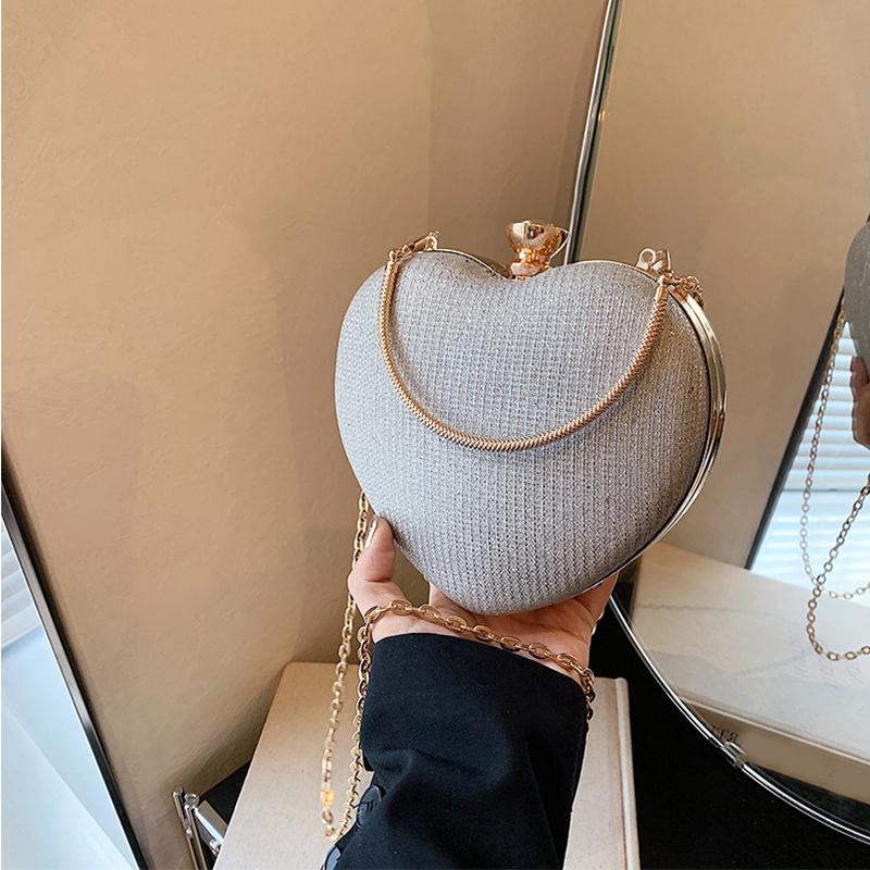 

Золотая яркая шелковая вечерняя сумочка в форме сердца для женщин, клатч для банкета, декорированная стразами, цепочка, сумки через плечо, роскошные женские вечерние сумки 16x4.5x15cm серебряный