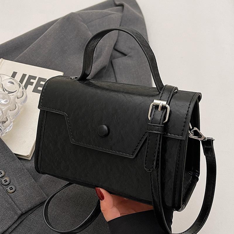 Wholesale new niche high-end sweet simple style solid color portable small square bag foreign style versatile commuter messenger bag