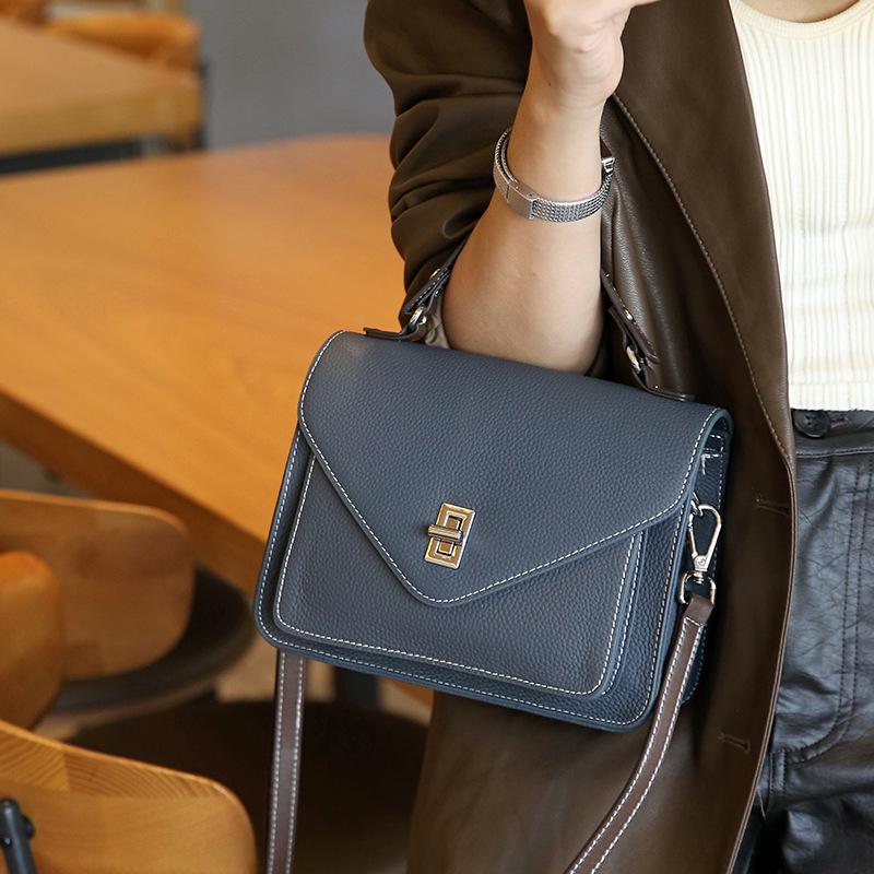 

Cowhide crossbody bag for women, versatile handbag for commuting, 2025 new model genuine leather women s bag, fashionable and luxurious shoulder bag peacock синього кольору