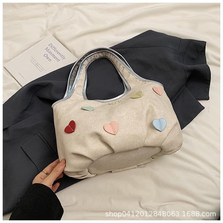 

Casual foreign style love armpit bag large capacity fashion tote bag Korean version niche commuter bag