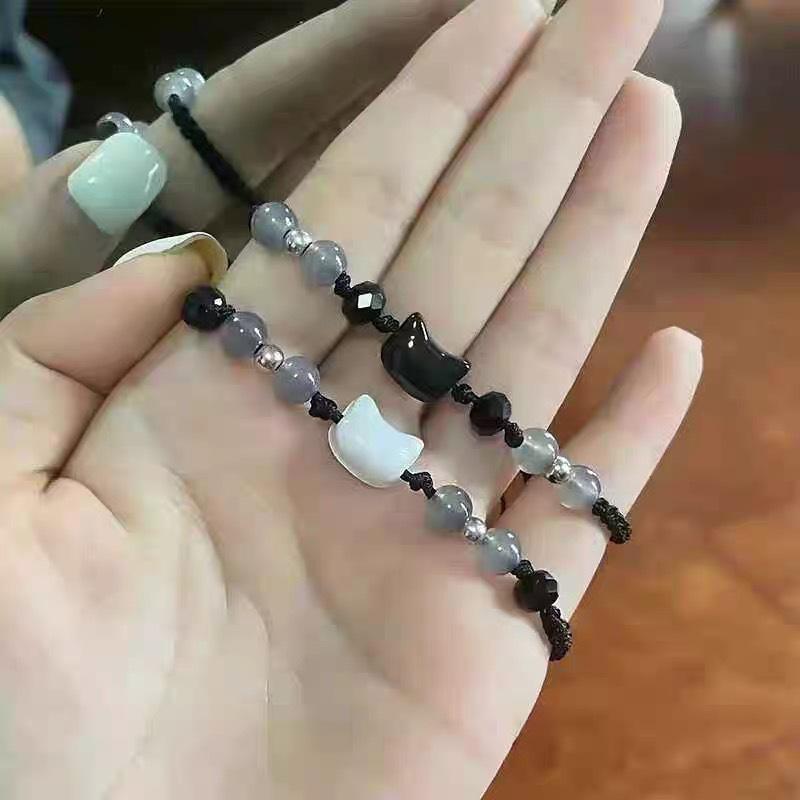 Xiaohongshu schwarze Katze weiße Katze Armband exquisit handgefertigt Nische gewebt Paar Handseil vielseitig