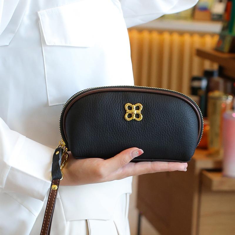 

First layer cowhide hand bag, new leather women s bag, high-end niche design, change bag, versatile mobile phone bag