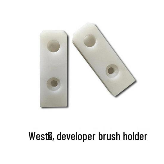 Xizhuo Punching Machine Accessories: Turbine Worm Gear, Rubber Roller, Bracket, and Brush Holder.