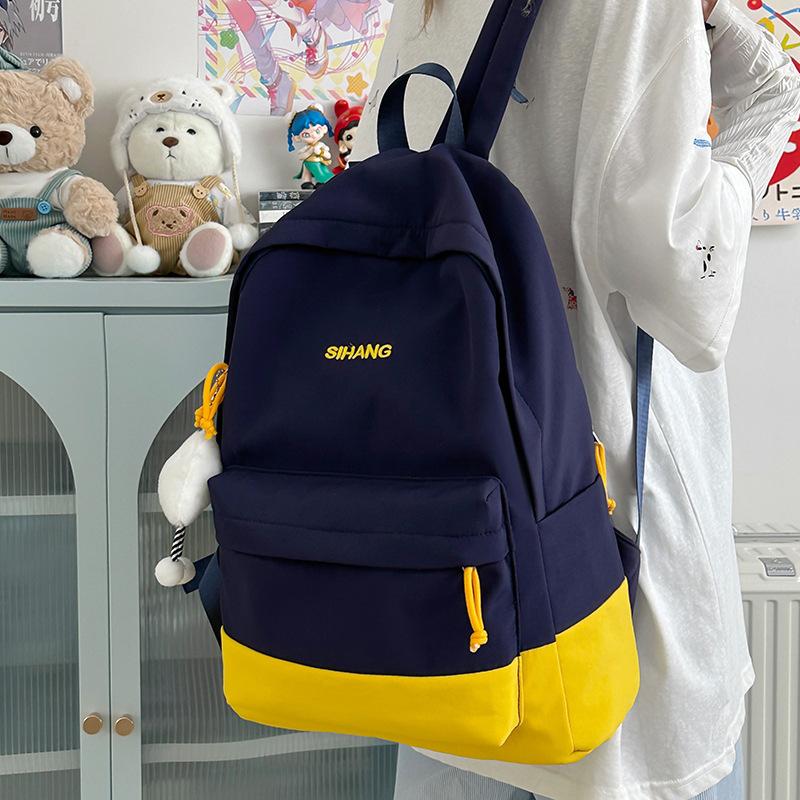Korean version of small fresh backpack fashionable large capacity high value backpack lightweight boys and girls junior high school student schoolbag
