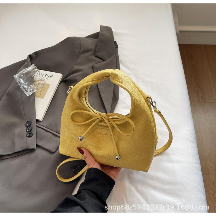 Korean version of simple portable bucket bag women's 2025 new spring and summer fashion shoulder bag versatile commuter crossbody bag