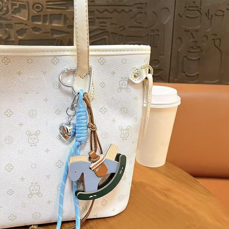 Creative leather rocking horse keychain cute trendy cool PU Trojan horse pendant men and women versatile bag hanging accessories small gifts