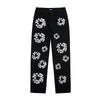 EastRogue High Street Hip Hop Streetwear Loose Fit Men's and Women's Denim Jeans with Washed Effect and Full Print of Hibiscus Flowers.