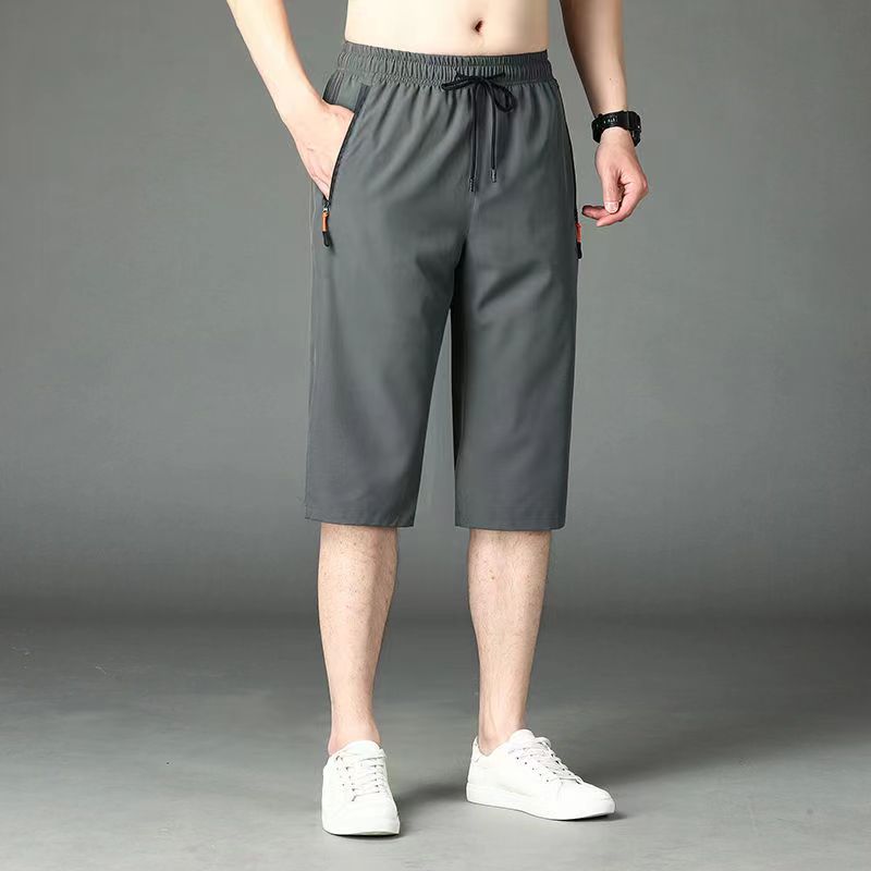 

Men s summer loose print outerwear seven quarter shorts straight leg oversized casual men s pants 4XL