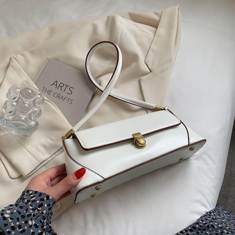 

Internet celebrity shoulder bag simple retro niche design trend casual new armpit commuter lock small square bag бежевий