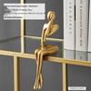 Elegant abstrakt sittande figurskulptur för heminredning