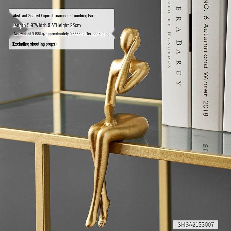 Elegant abstrakt sittande figurskulptur för heminredning