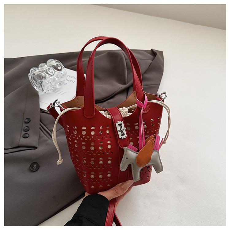 New soft and durable vintage handheld large capacity premium texture soft and durable outdoor handmade shoulder crossbody hollowed bucket bag