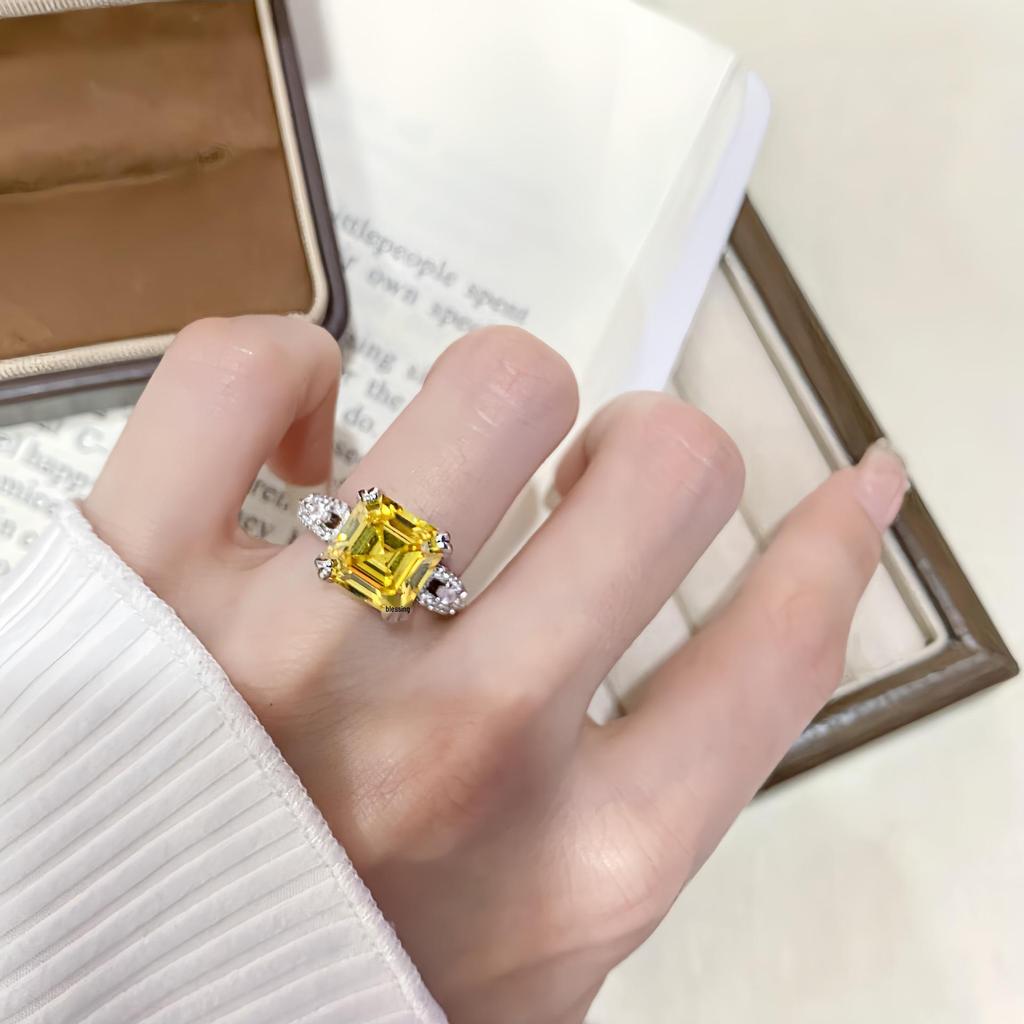 Elegant Yellow Diamond Ring with Square Pink Open Design