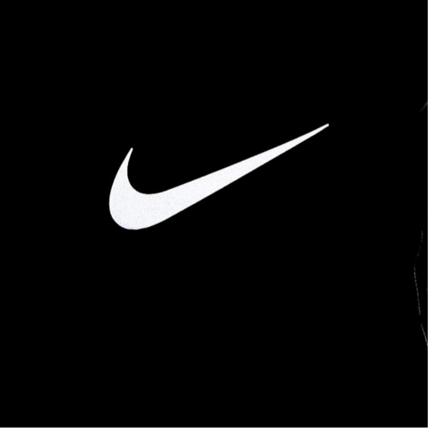 Nike Pánské fotbalové kalhoty s potiskem loga, se středně vysokým pasem, s elastickými manžetami, úzkého střihu, černé FZ0571-010