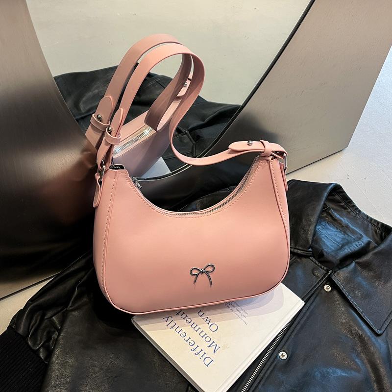 

New fashionable solid color bag texture 2025 casual bow dumpling bag single shoulder underarm bag moon tooth bag black розовый