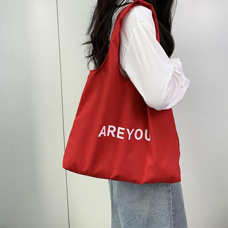 

Red Canvas Bag Korean Style All-Matching Lazy Style Summer Women s 2025 New Arrival Shoulder Large Capacity Letter Commuter Bag Red ARE YOU