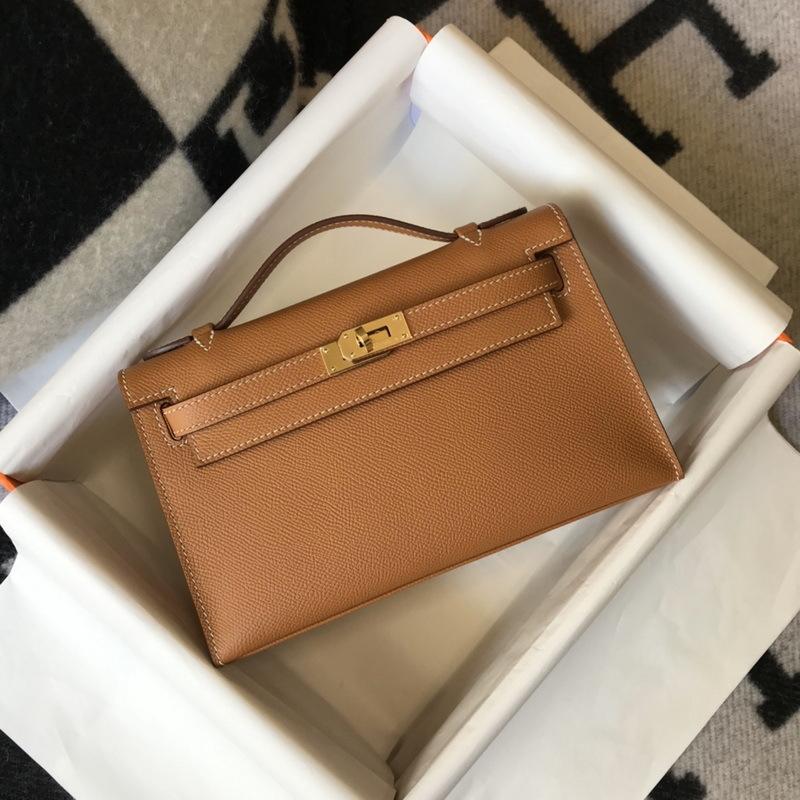 Nuova borsa da donna in vera pelle, mini generazione, alla moda, portatile, con palmo in pelle bovina di primo strato, 22 cm