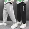 Sportliche Sweatpants mit Buchstabenaufdruck für Kinder Mode Lockere Lange Hose Jogginghose Jungen Freizeit Dünne Sporthose