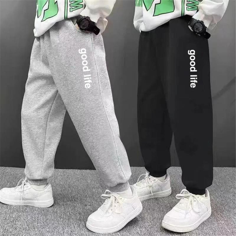 Sportliche Sweatpants mit Buchstabenaufdruck für Kinder Mode Lockere Lange Hose Jogginghose Jungen Freizeit Dünne Sporthose
