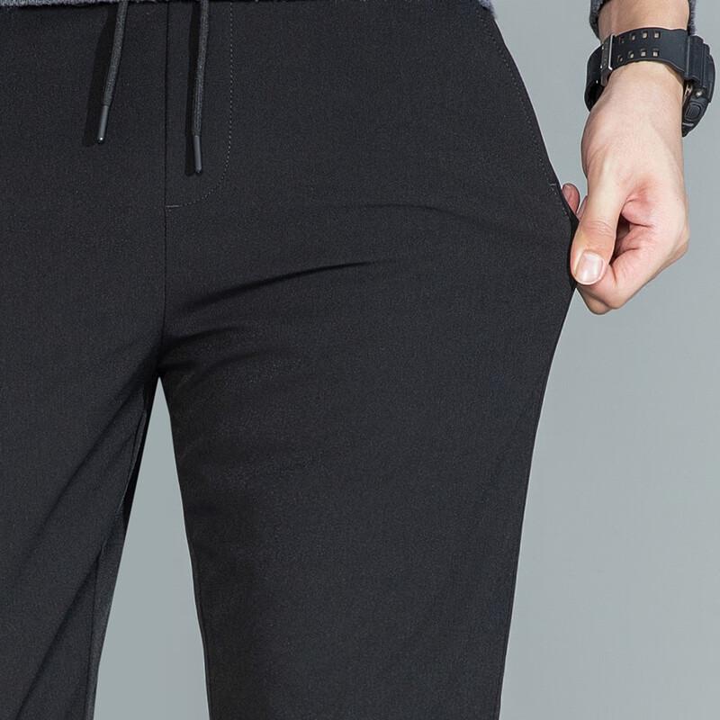 XueZhongFei Men's Winter Lightweight Goose Down Pants