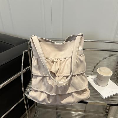 Κορεάτικη φούστα βολάν υφασμάτινη τσάντα γυναικεία 2025 νέα μοντέρνα μόδα niche τσάντα tote μεγάλη χωρητικότητα τσάντα ώμου